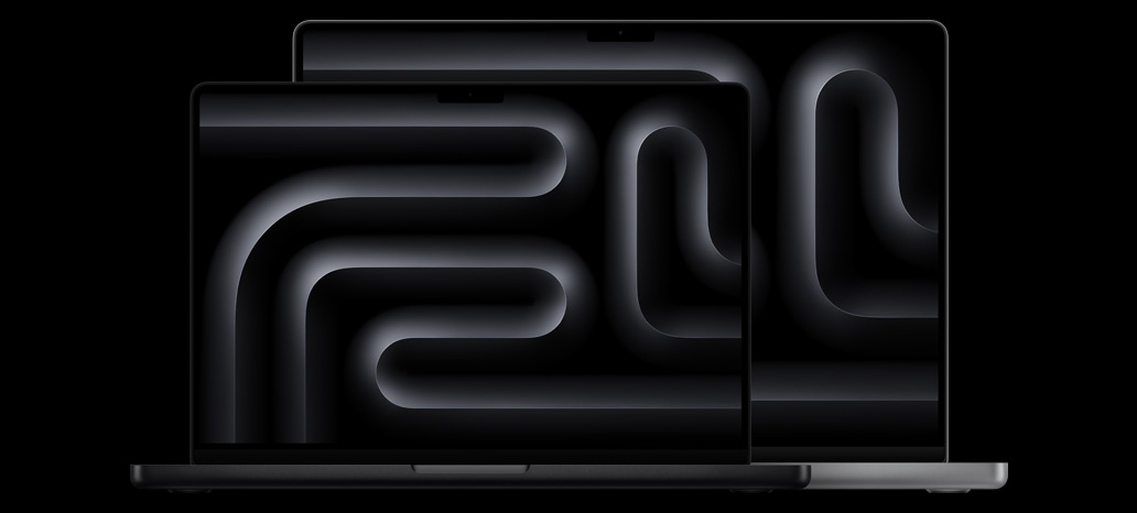 Dwa laptopy MacBook Pro zestawione w?celu zobrazowania ró?nicy rozmiaru mi?dzy wy?wietlaczem o?przek?tnej 14,2?cala a wy?wietlaczem o przek?tnej 16,2?cala